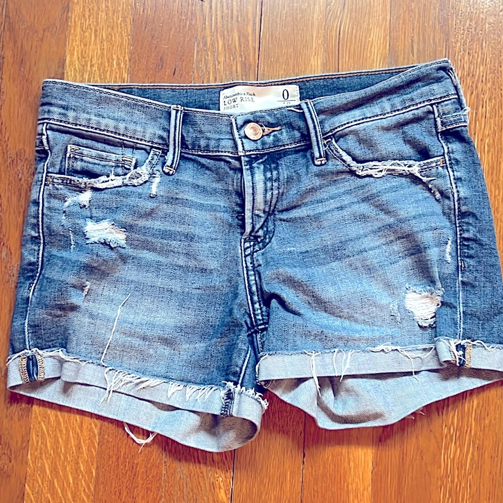 Abercrombie & Fitch low rise denim shorts with 3 1/2” inseam.